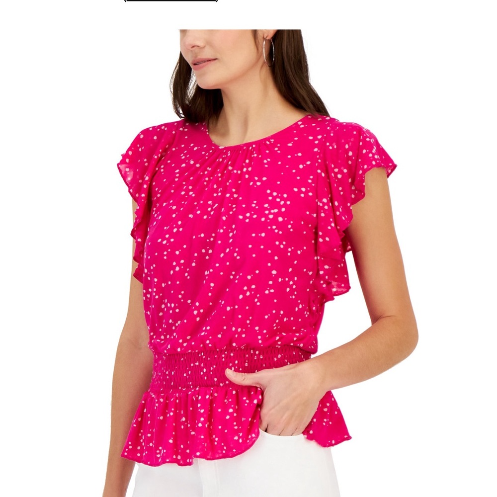 Pink top. Tried on but never worn